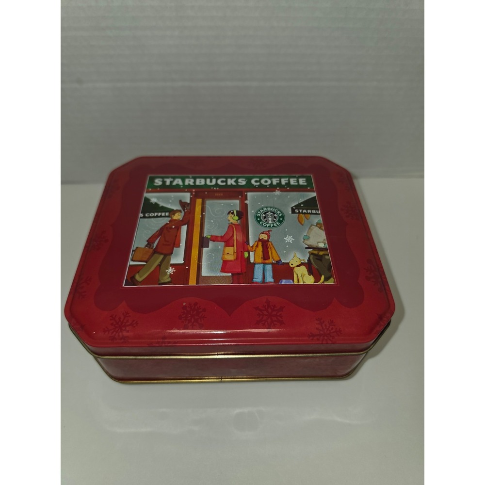 red rectangular Starbucks Coffee holiday cookie tin featuring‎ a festive winter